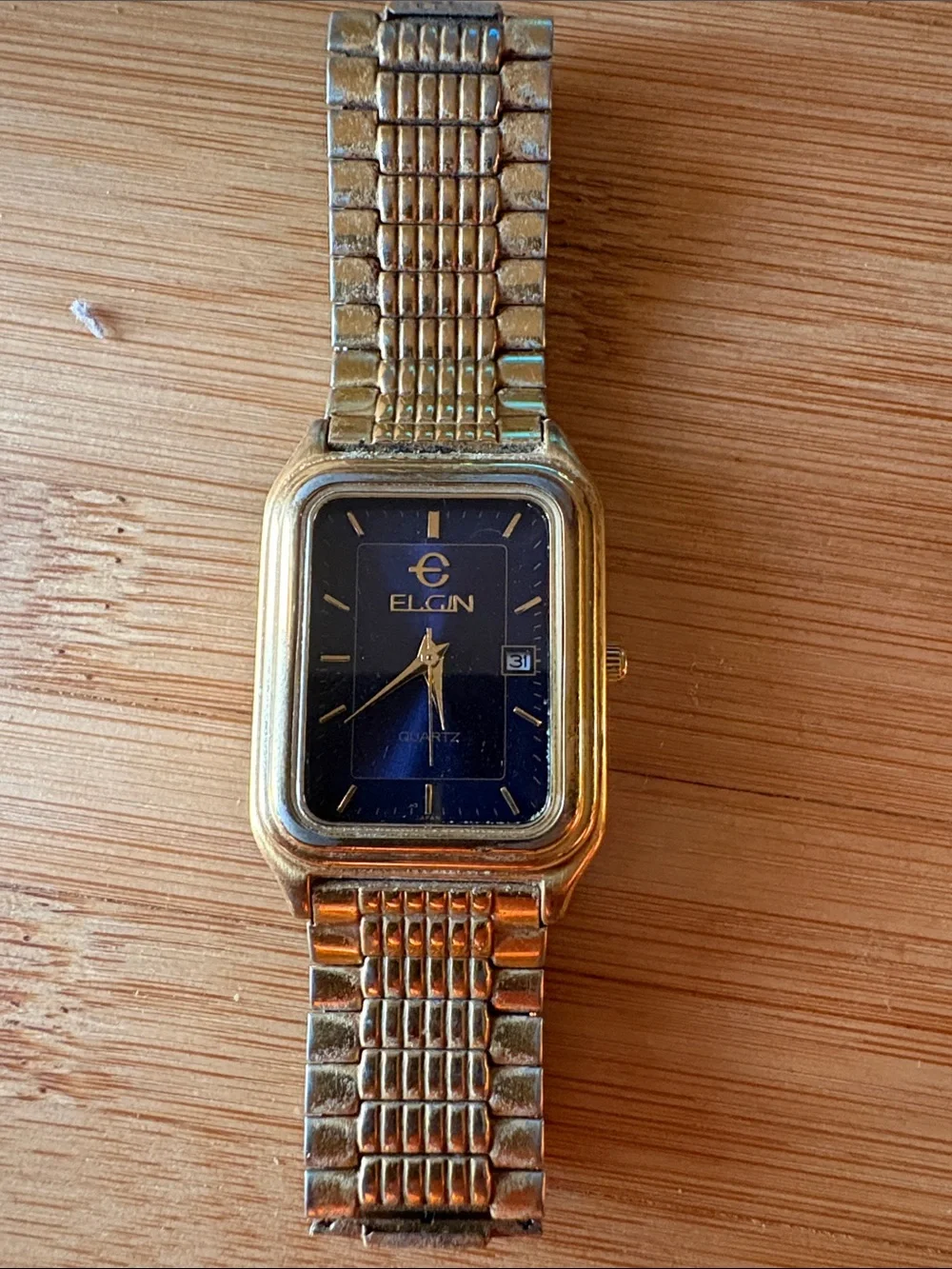 Elgin gold tone